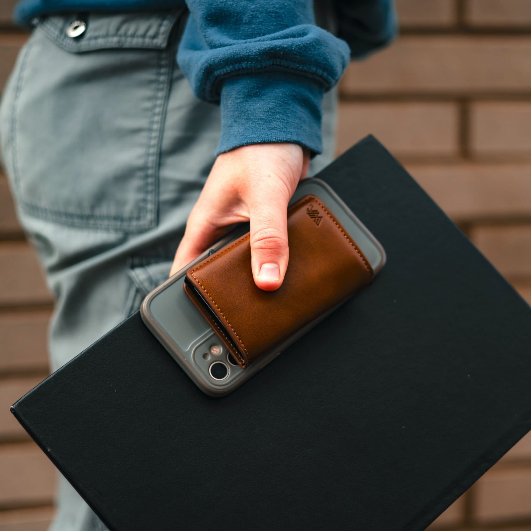 WalletAces - Our Story Image - Model With Enigma Wallet Classic Brown