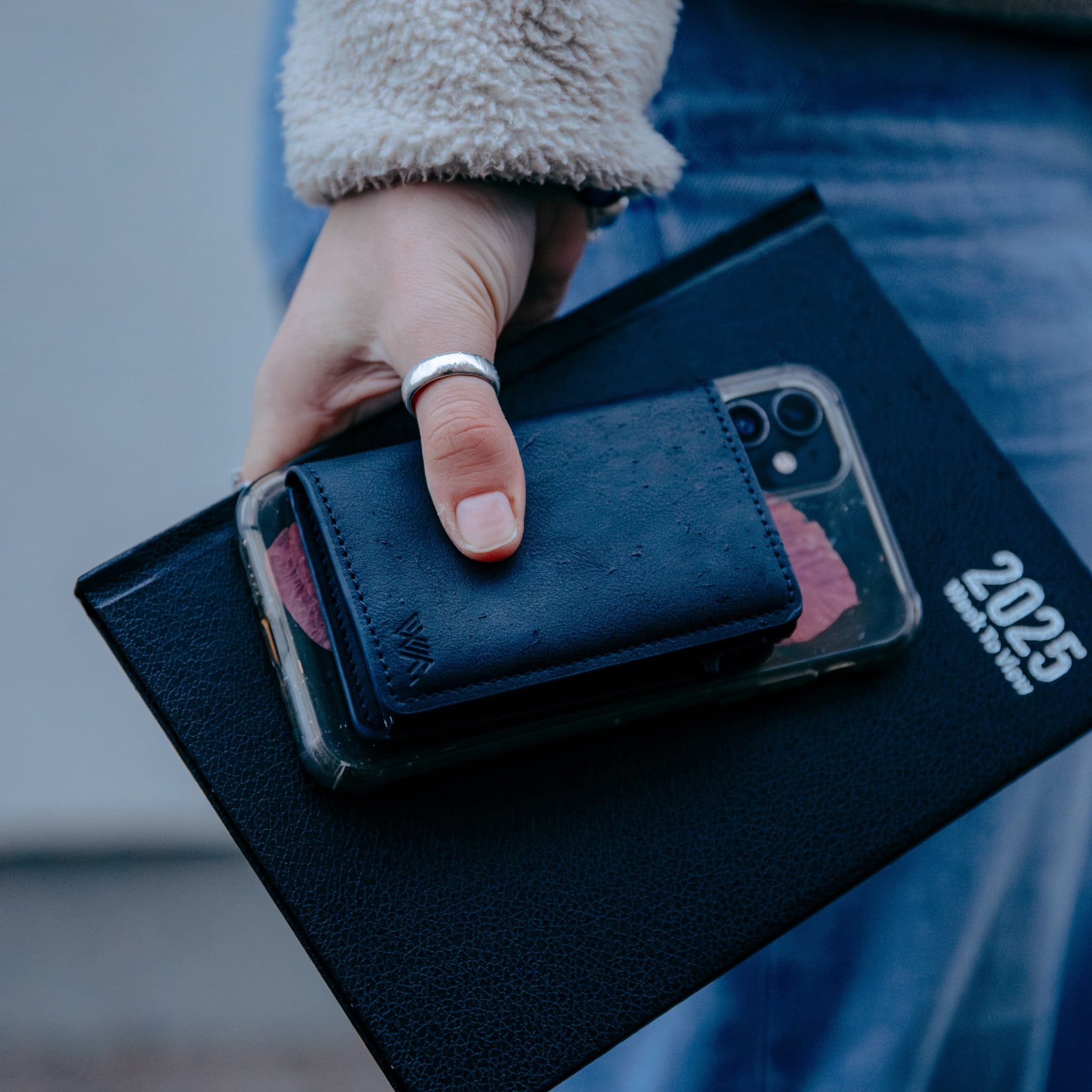 WalletAces - Our Story Image - Model With Enigma Wallet Navy Blue